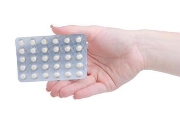 Blister of pills medicine pharmacy in hand on white background isolation