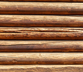 Obraz premium Wooden wall from a log house as an abstract background.