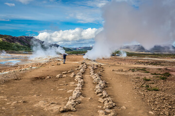 Hverir geothermal area with boiling mudpools and steaming fumaroles, Iceland
