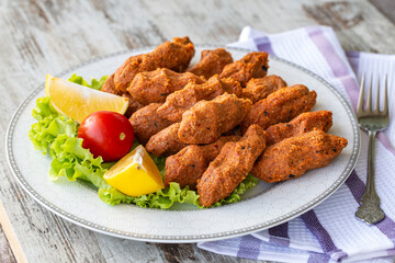 Newly built raw meatballs, turkey specific food, cig kofte, close-up,