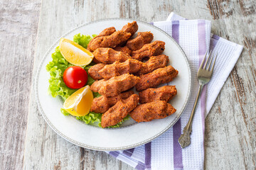 Newly built raw meatballs, turkey specific food, cig kofte, close-up,