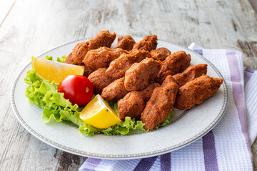Newly built raw meatballs, turkey specific food, cig kofte, close-up,