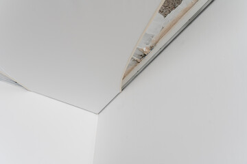 Stretch ceiling in the kitchen with installed and included spotlights