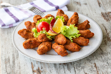 Newly built raw meatballs, turkey specific food, cig kofte, close-up,