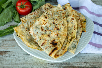 Turkish delicious foods; spinach patty (D borek, gozleme)