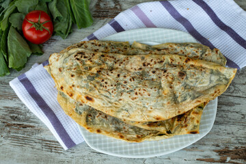 Turkish delicious foods; spinach patty (D borek, gozleme)