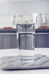 Glass with pure water on a table