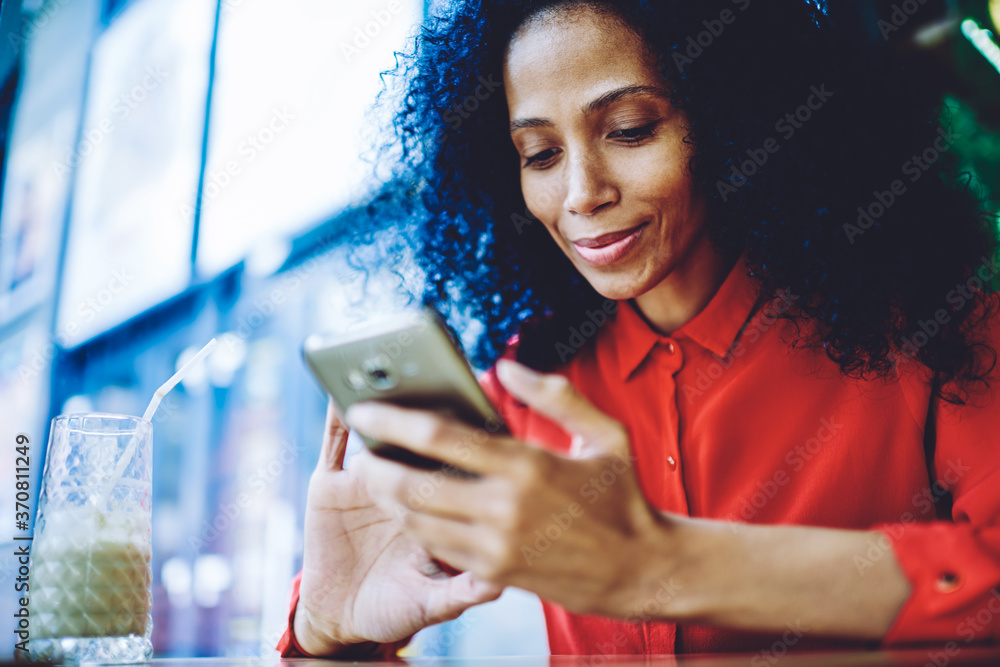Poster concept of technology and communication, positive afro american female blogger enjoying communicatio