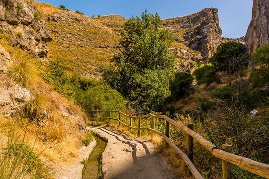 The Los Cahorros pathway leads into the  Sierra Nevada mountains outside Monachil, Spain in the summertime