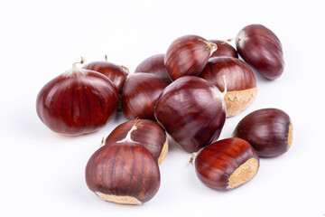Chestnut Isolated. Roasted sweet chestnuts for Christmas on white background. Top view. 