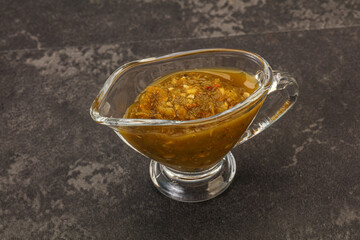 Green spicy sauce in the bowl