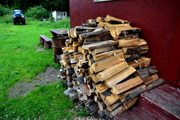 woodpile near the porch in the Russian village