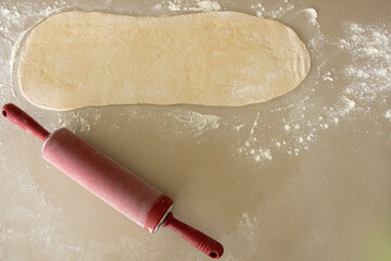 Dough and roller for preparing pastries
