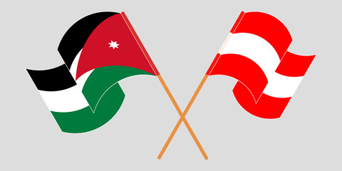 Crossed and waving flags of Jordan and Austria