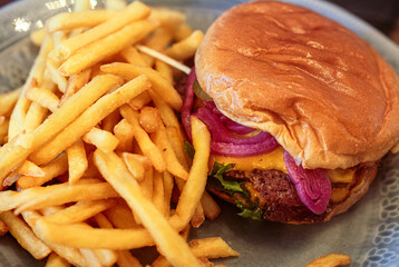 Hamburger and french fries on a plate