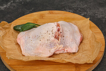 Raw chicken hip with spices