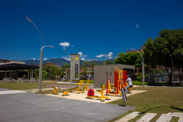 Medellin, Antioquia / Colombia August 12, 2018 Person exercising on outdoor machines.