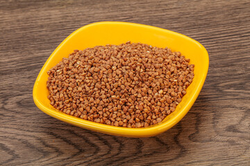 Raw buсkwheat cereal in the bowl