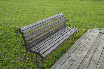 bench on a green lawn
