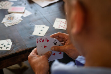 Medellin, Antioquia / Colombia. September 17, 2019. People playing card game card (Detail)