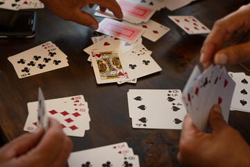 Medellin, Antioquia / Colombia. September 17, 2019. People playing card game card (Detail)