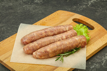 Raw pork meat sausages for grill