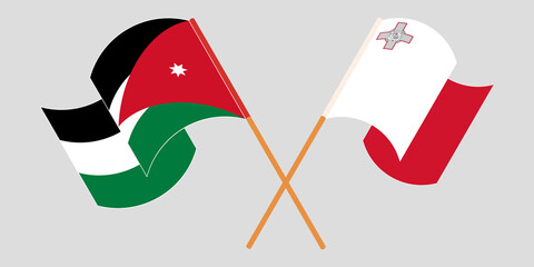 Crossed and waving flags of Jordan and Malta