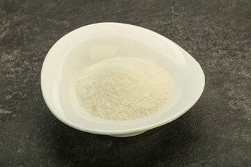 White sugar in the bowl