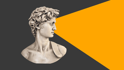 Head of an antique statue on a gray background with an orange triangle in front - obrazy, fototapety, plakaty