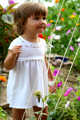 little girl in a garden