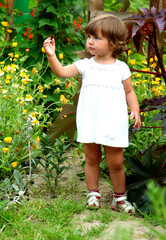 little girl in the garden