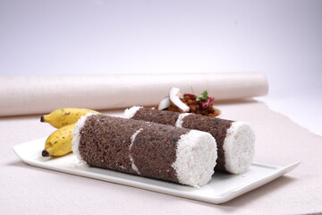 Ragi Puttu or Finger Millet  steamed cake with bengal gram curry