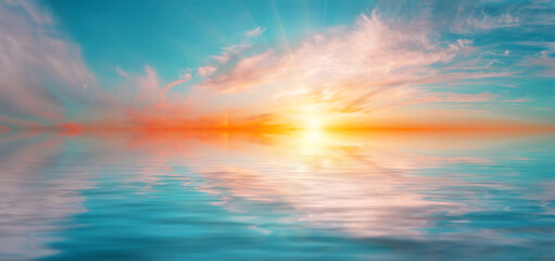 Naklejka na ściany i meble Panorama of morning dramatic sky with bright sun above water surface