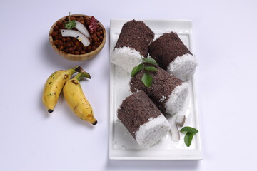 Ragi Puttu or Finger Millet  steamed cake with bengal gram curry