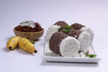 Ragi Puttu or Finger Millet  steamed cake with bengal gram curry