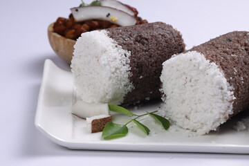 Ragi Puttu or Finger Millet  steamed cake with bengal gram curry