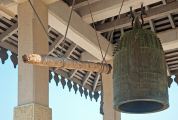 The wooden hammer to ring the big bell 