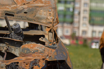 city burned cars after a fire in one of the city's districts