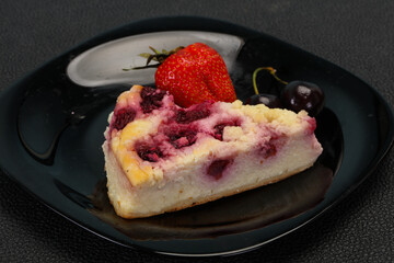 Cheesecake with cherry served strawberry