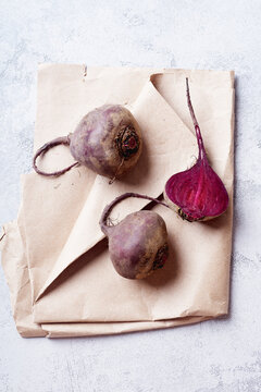 Fresh whole and sliced beetroot viewed from above