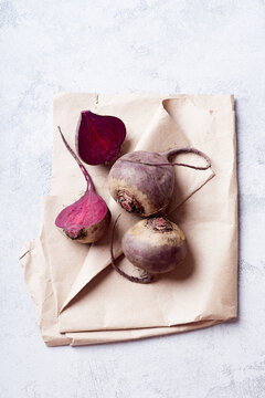 Fresh whole and sliced beetroot viewed from above