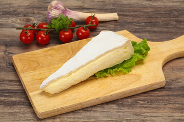 Brie cheese triangle served salad