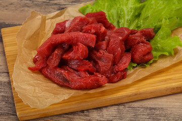 Raw beef meat sliced for cooking