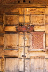 Old wooden door to mausoleum at Denver's historic Riverside Cemetery