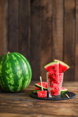 watermelon slices pieces red ripe berry juicy sweet dessert fruit food background top view copy space for text organic eating healthy 