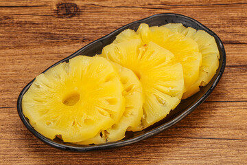 Marinated pineapple rings in the bowl