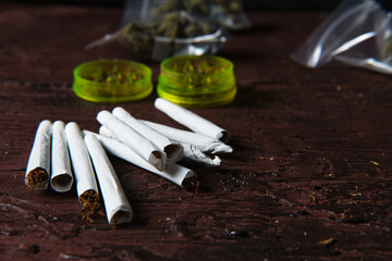 Marijuana buds and cigarettes for making joint