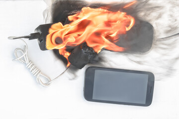 power supply burns with fire, phone on recharge, the fire in the apartment. cause of the fire counterfeit charger