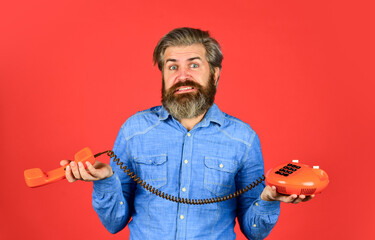 Answering machine. Bearded man phone conversation. Cold Calling Scripts. Outdated technology....