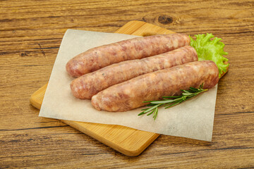 Raw pork meat sausages for grill